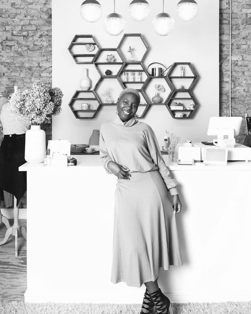 A boutique owner in her store